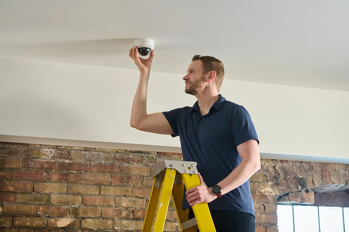 a K&S technician installing commercial security camera